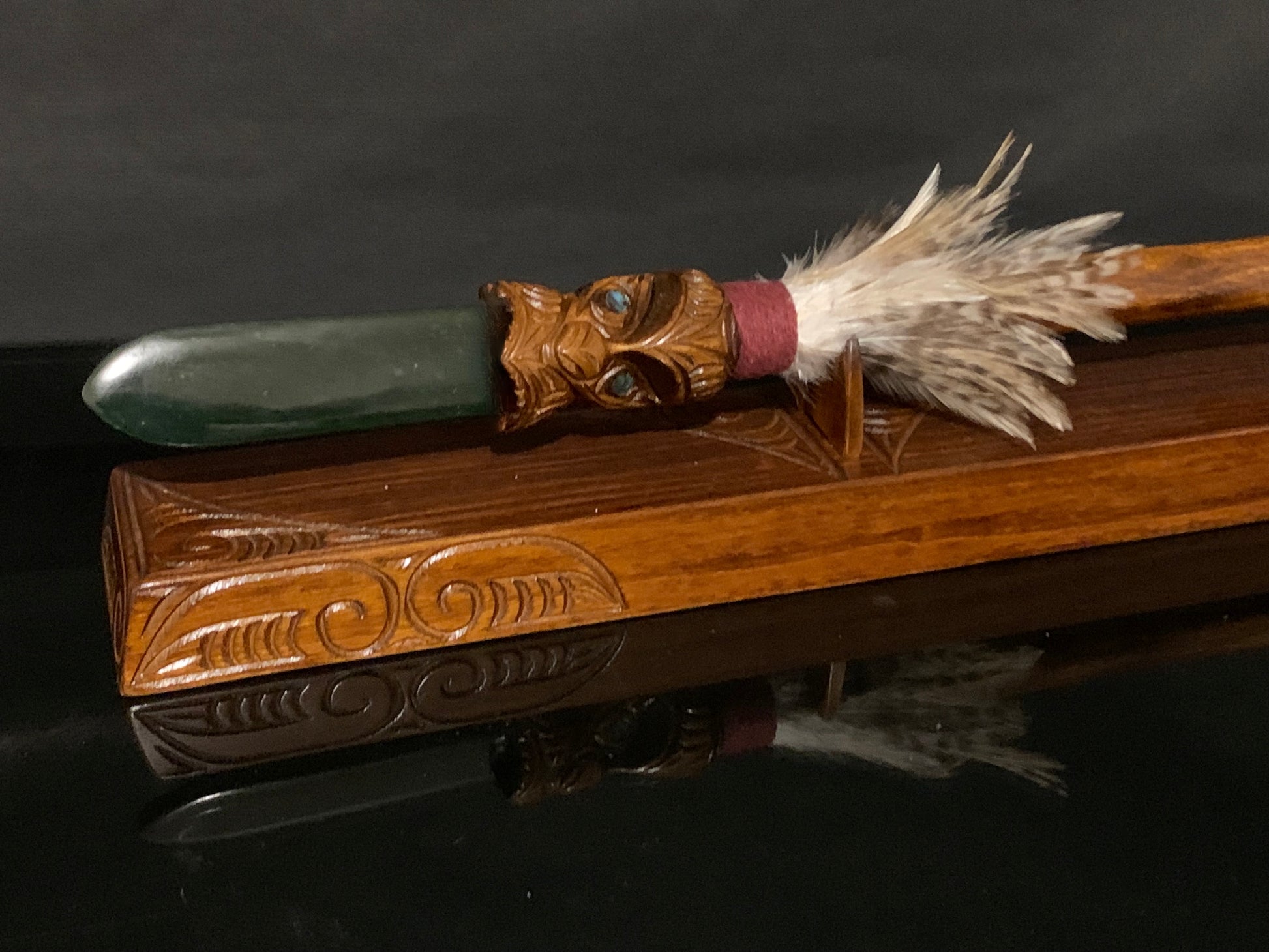 wood and greenstone  taiaha weapon carved in New Zealand and available from Silver Fern Gallery