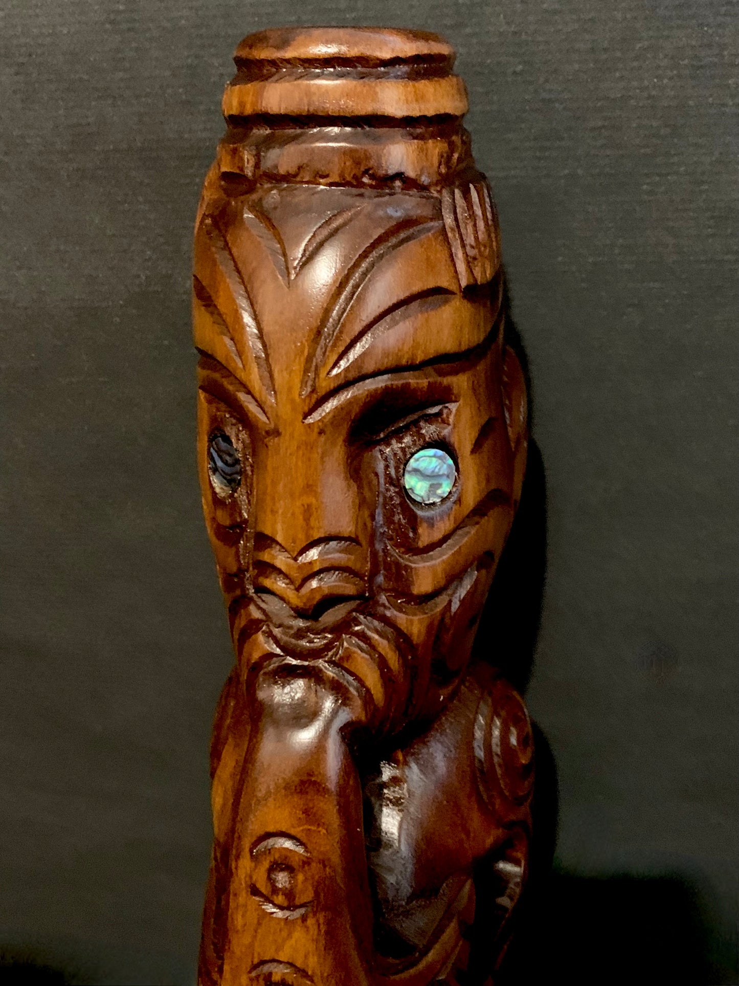 Close up of New Zealand Maori teko teko carved by Wood Masters Silver Fern Gallery