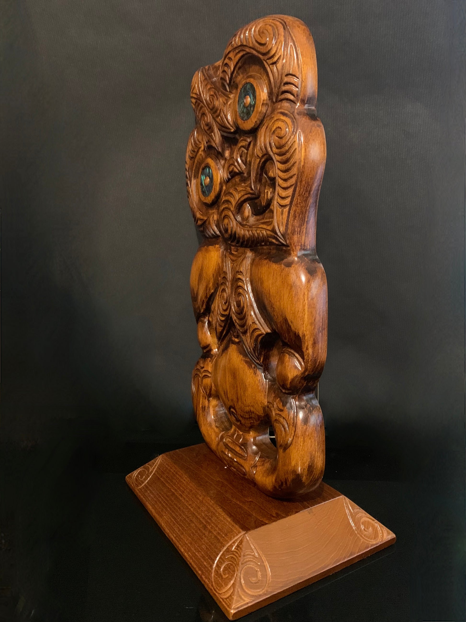 side view of tiki on stand by Wood Masters available from Silver Fern Gallery