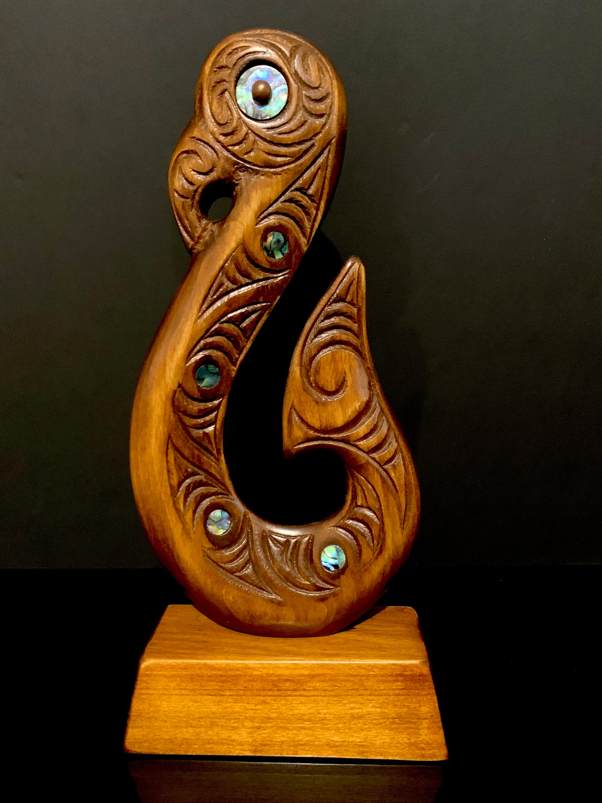 small matau fish hook on base by Wood Masters available from Silver Fern Gallery