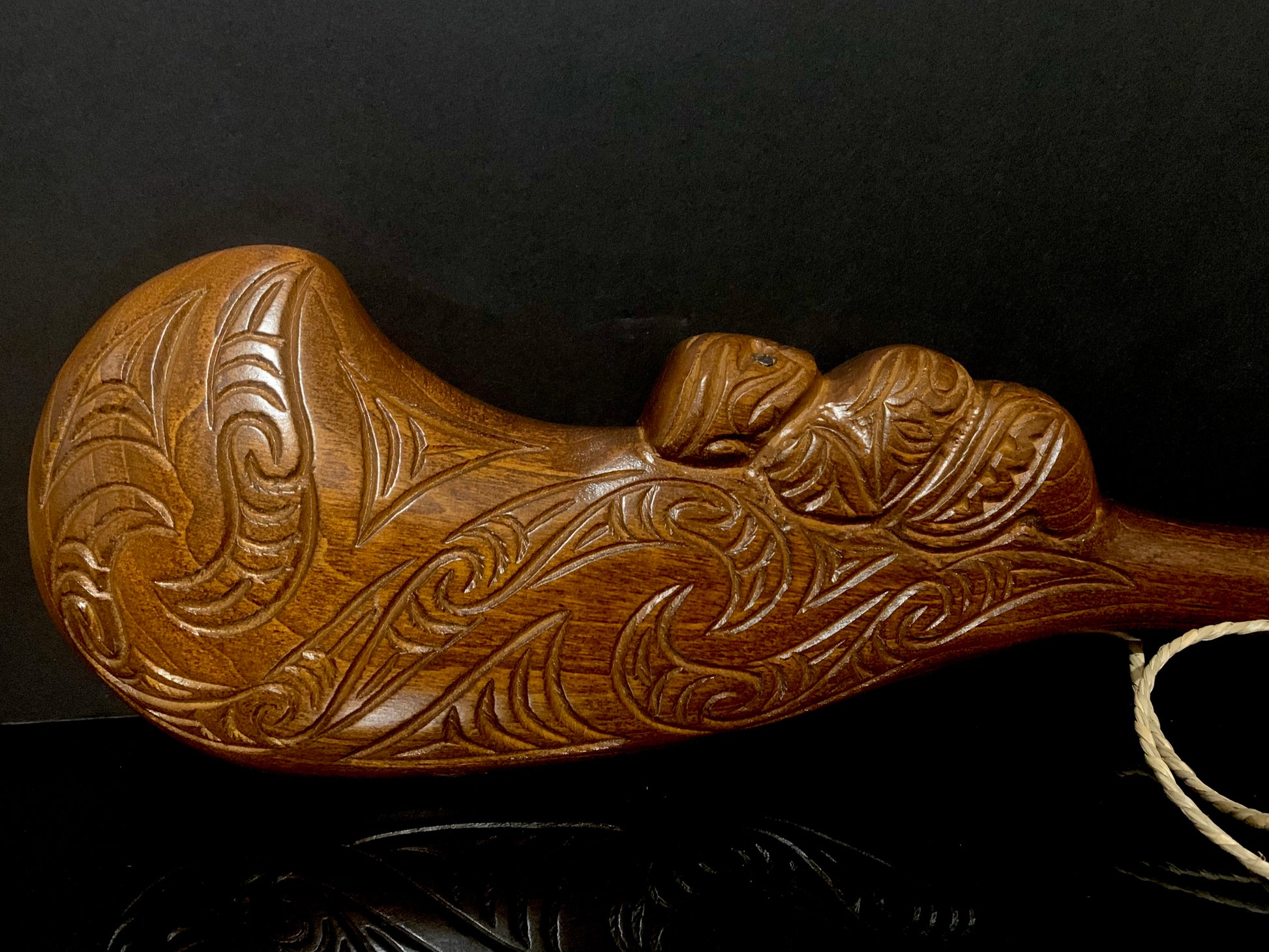 close up of Maori wood wahaika weapon carved in New Zealand and available from Silver Fern Gallery