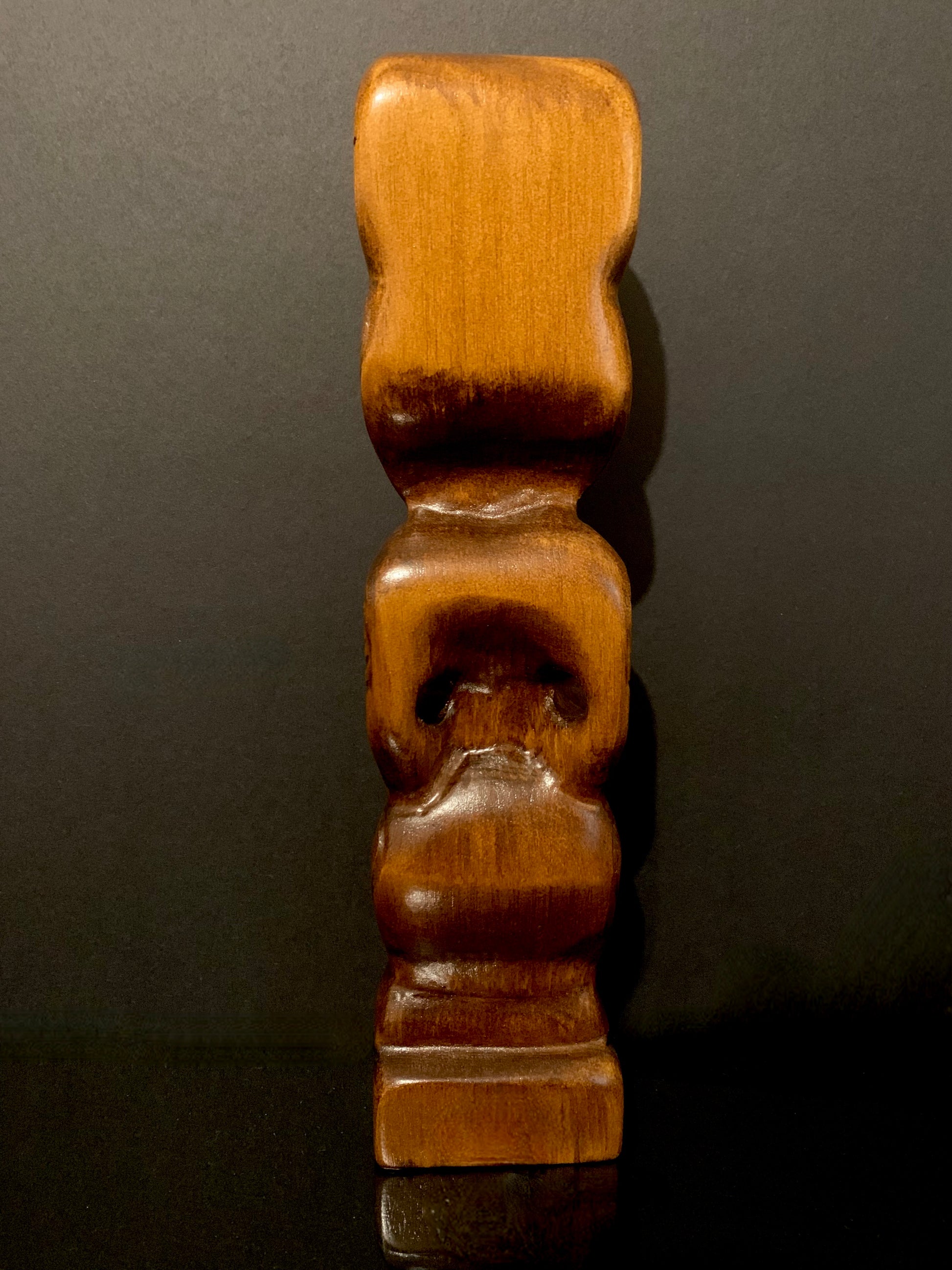 back view of small Maori teko teko carved in New Zealand by Wood Masters available from Silver Fern Gallery