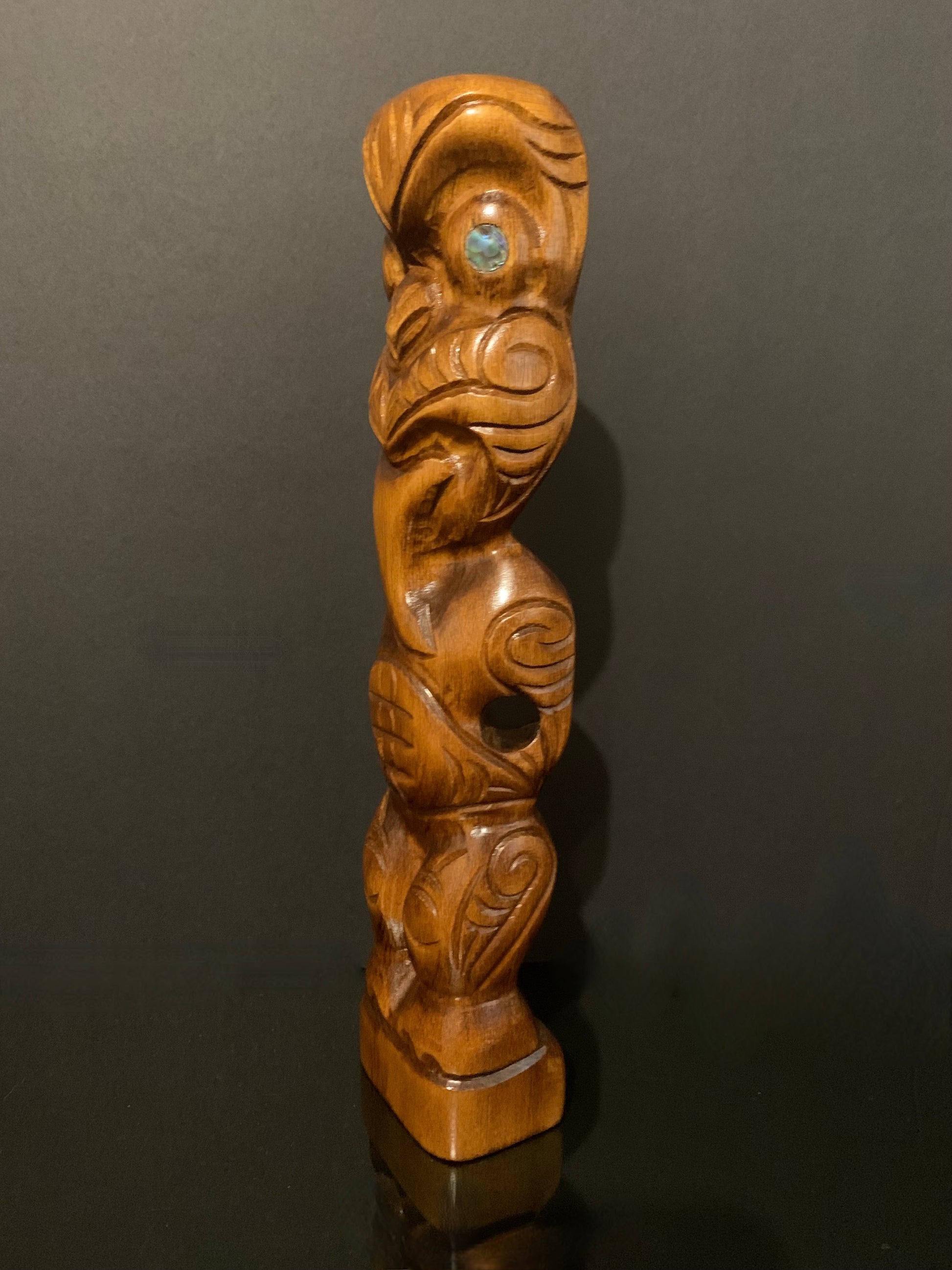 view looking left of small Maori teko teko carved in New Zealand by Wood Masters available from Silver Fern Gallery