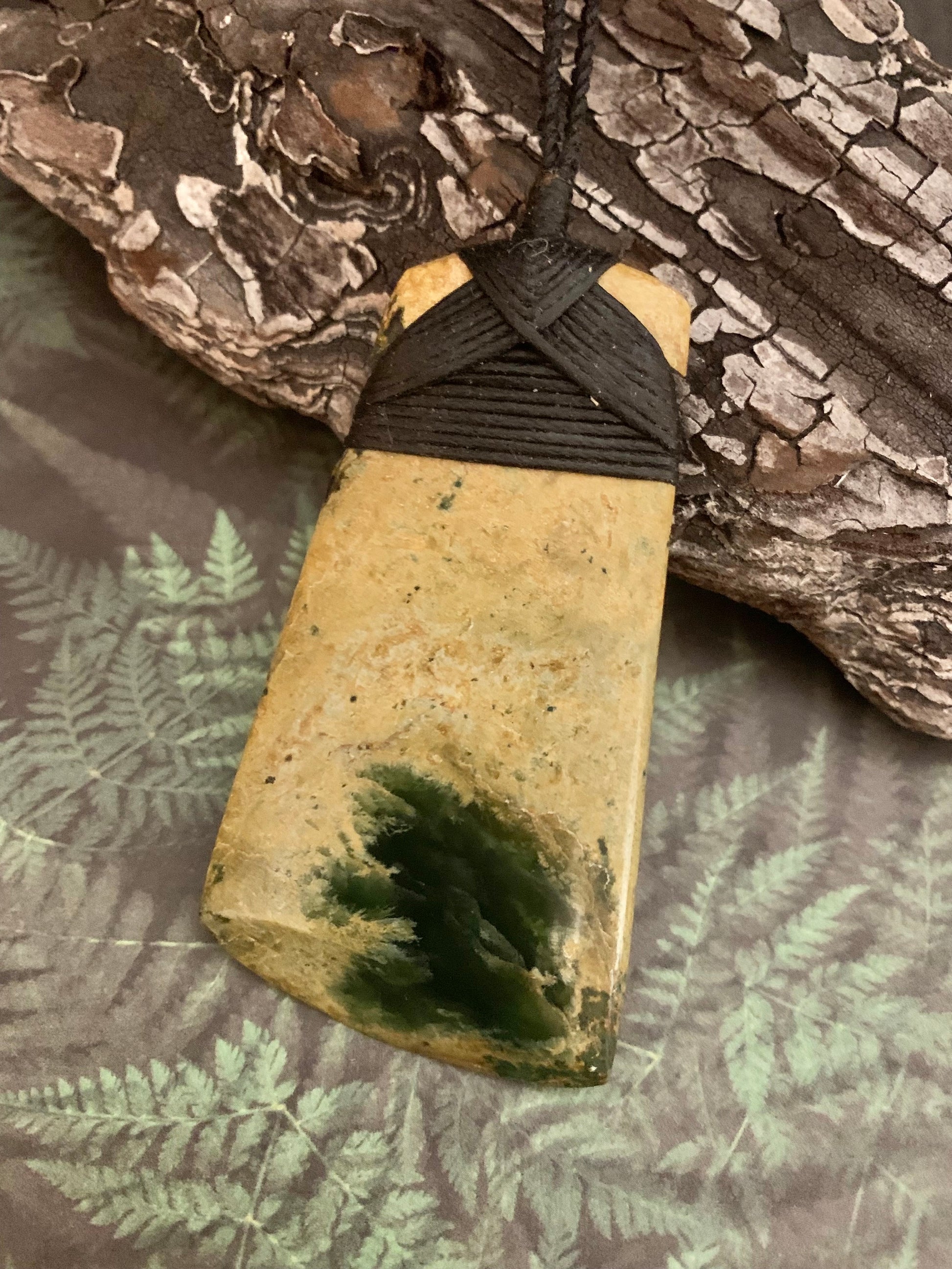 stunning Maori Pounamu hei toki pendant from New Zealand available to purchase