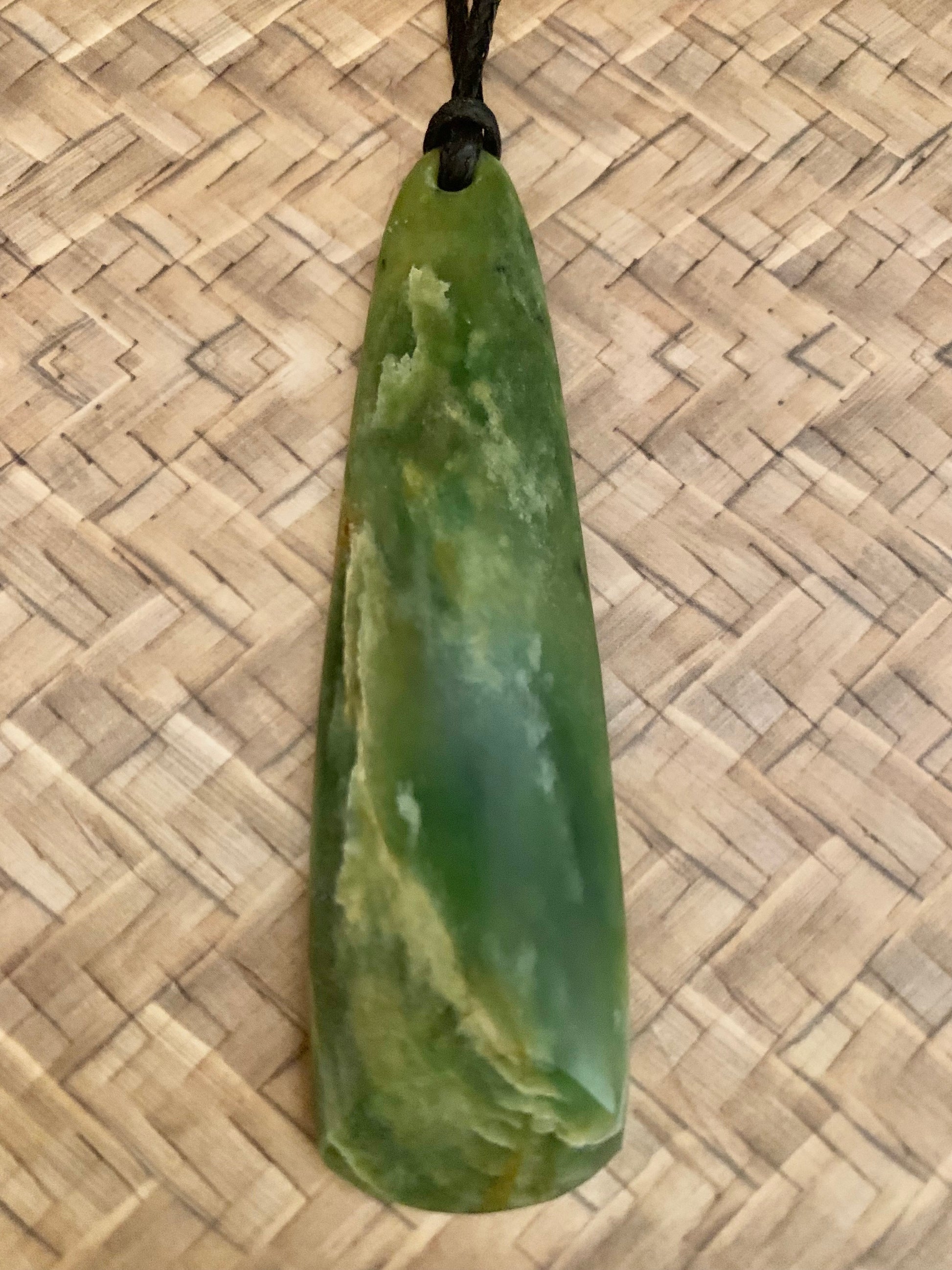 Pounamu drop pendant from New Zealand available from Silver Fern Gallery