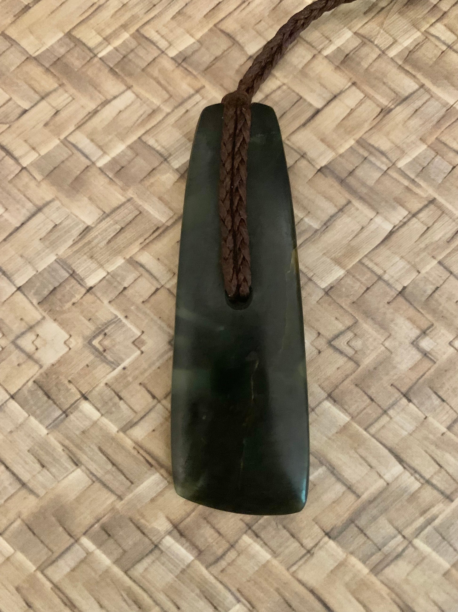 Contemporary Maori Pounamu hei toki pendant from New Zealand by Alex Sands available to purchase