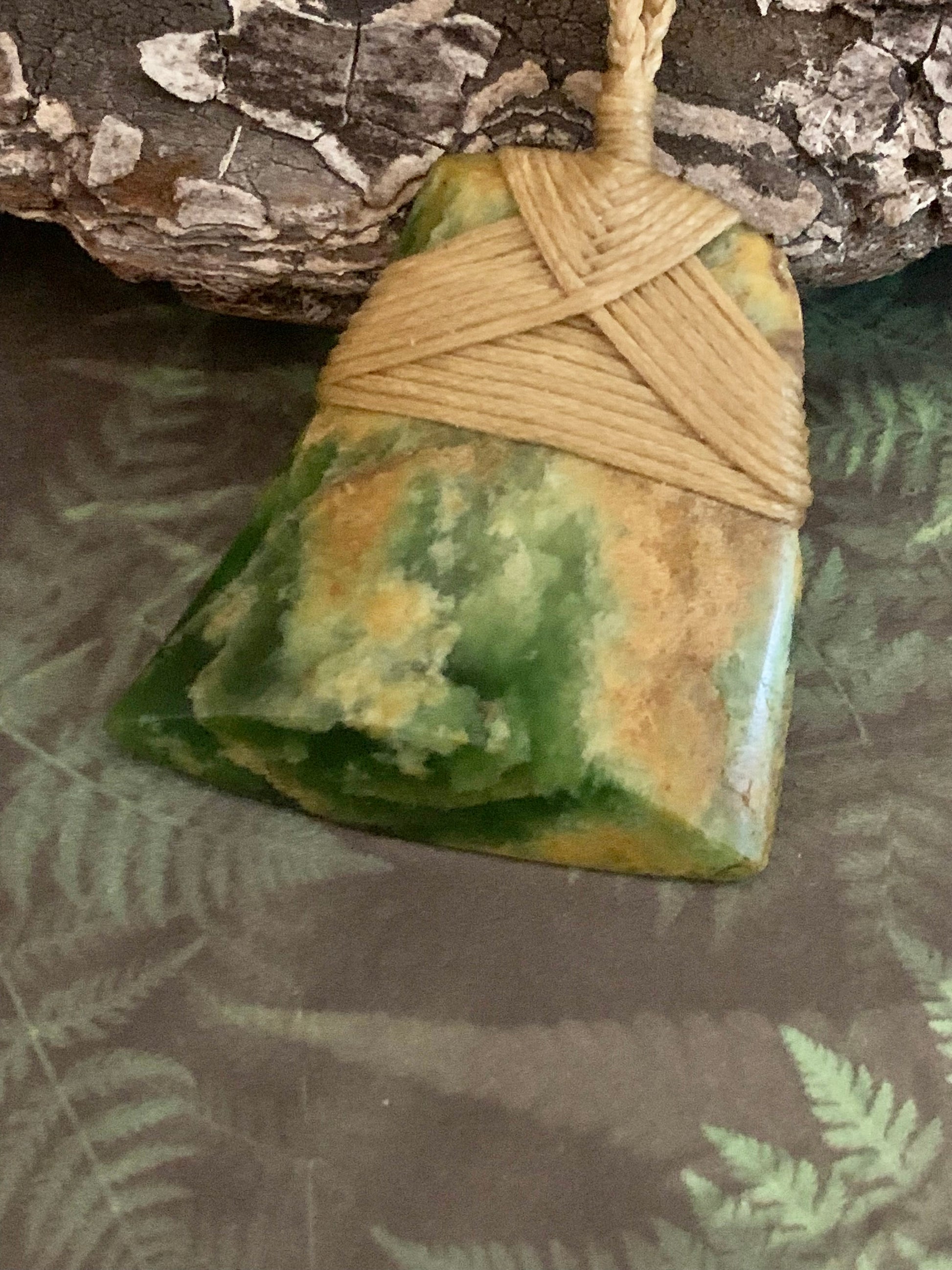 Maori Flower Jade Pounamu hei toki pendant from NZ and available to purchase