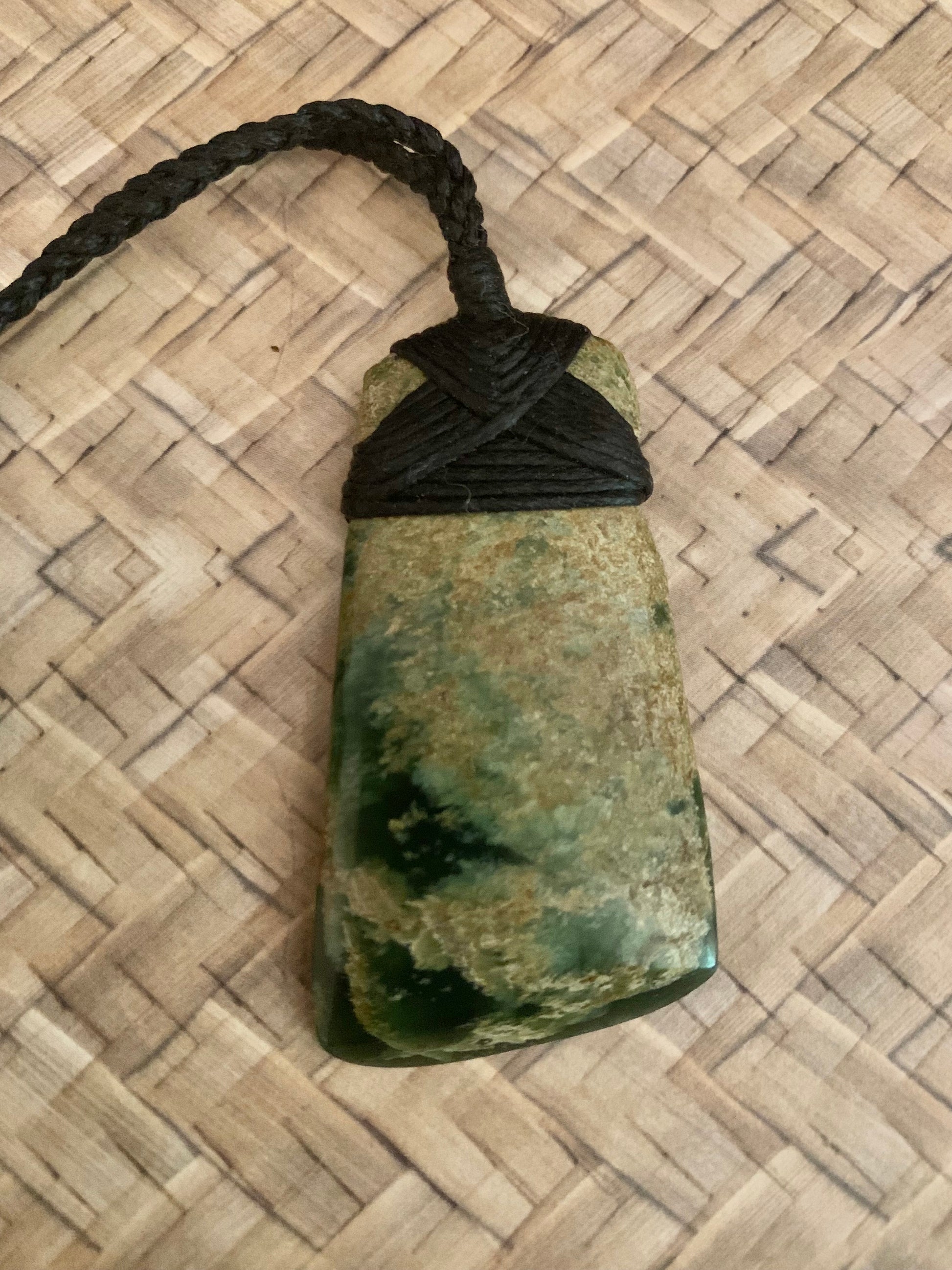 Maori Pounamu hei toki pendant from New Zealand available at Silver Fern Gallery