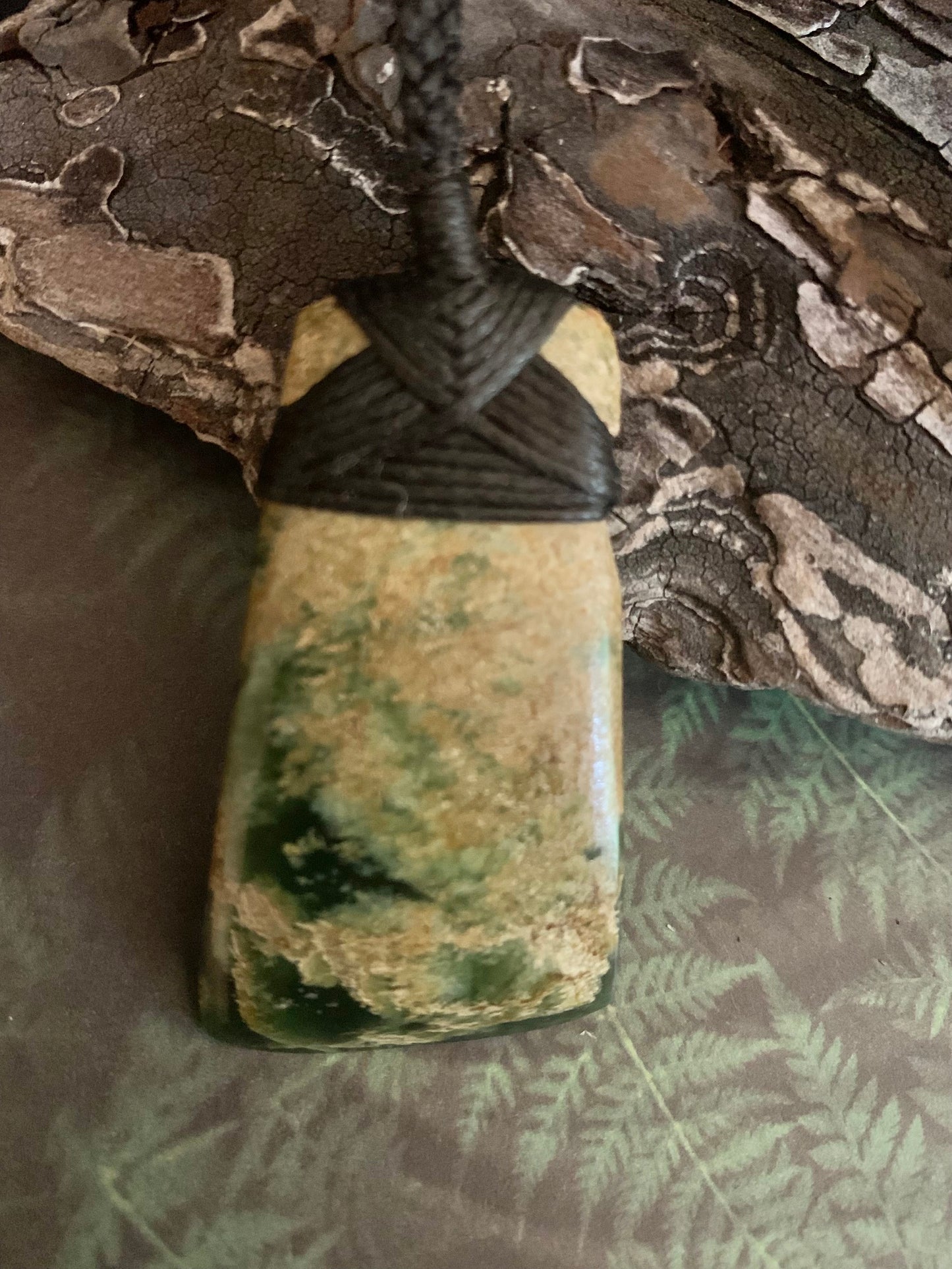 Maori Pounamu hei toki pendant from New Zealand available at Silver Fern Gallery