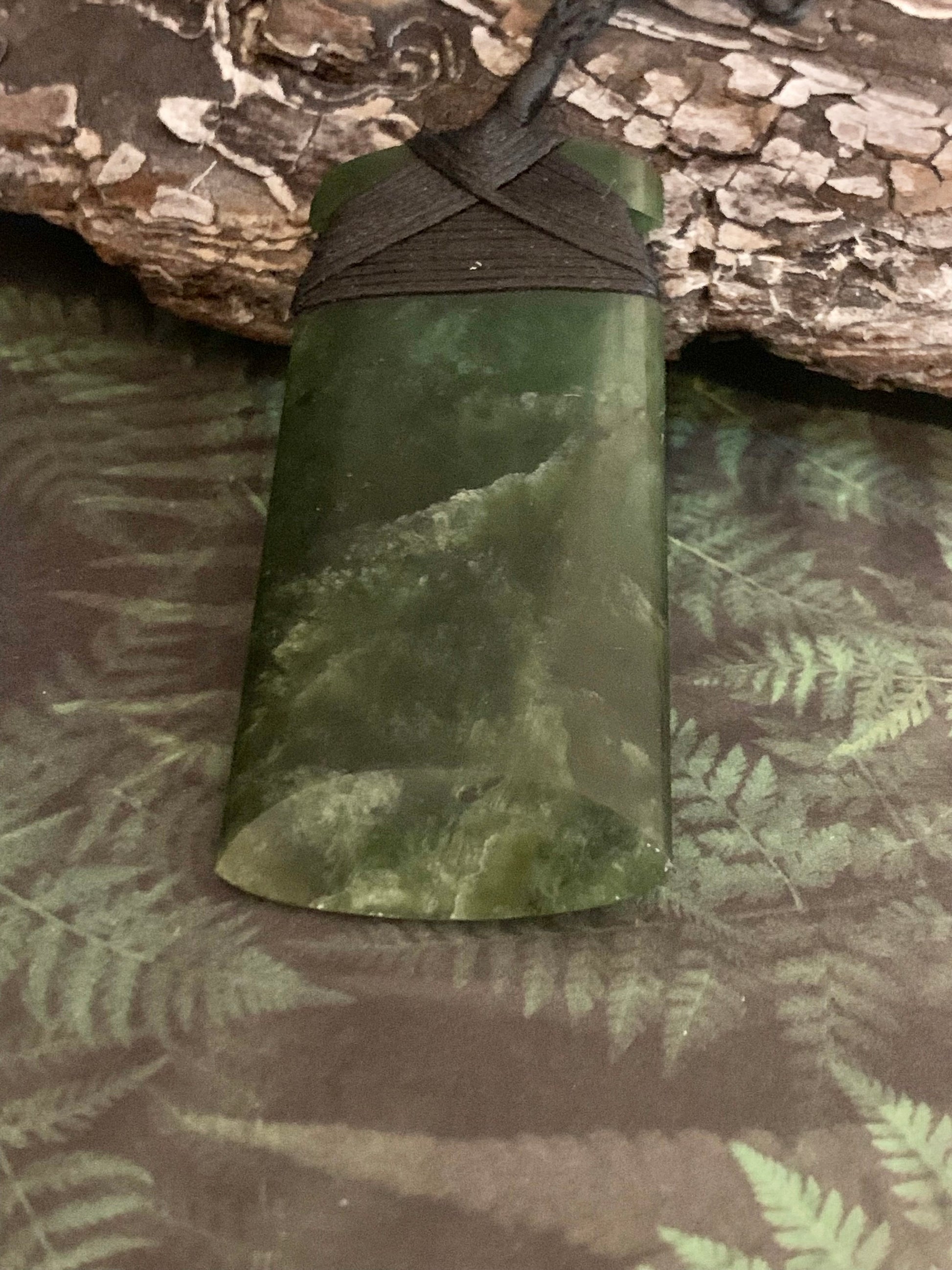 Maori Pounamu hei toki pendant from New Zealand available at Silver Fern Gallery