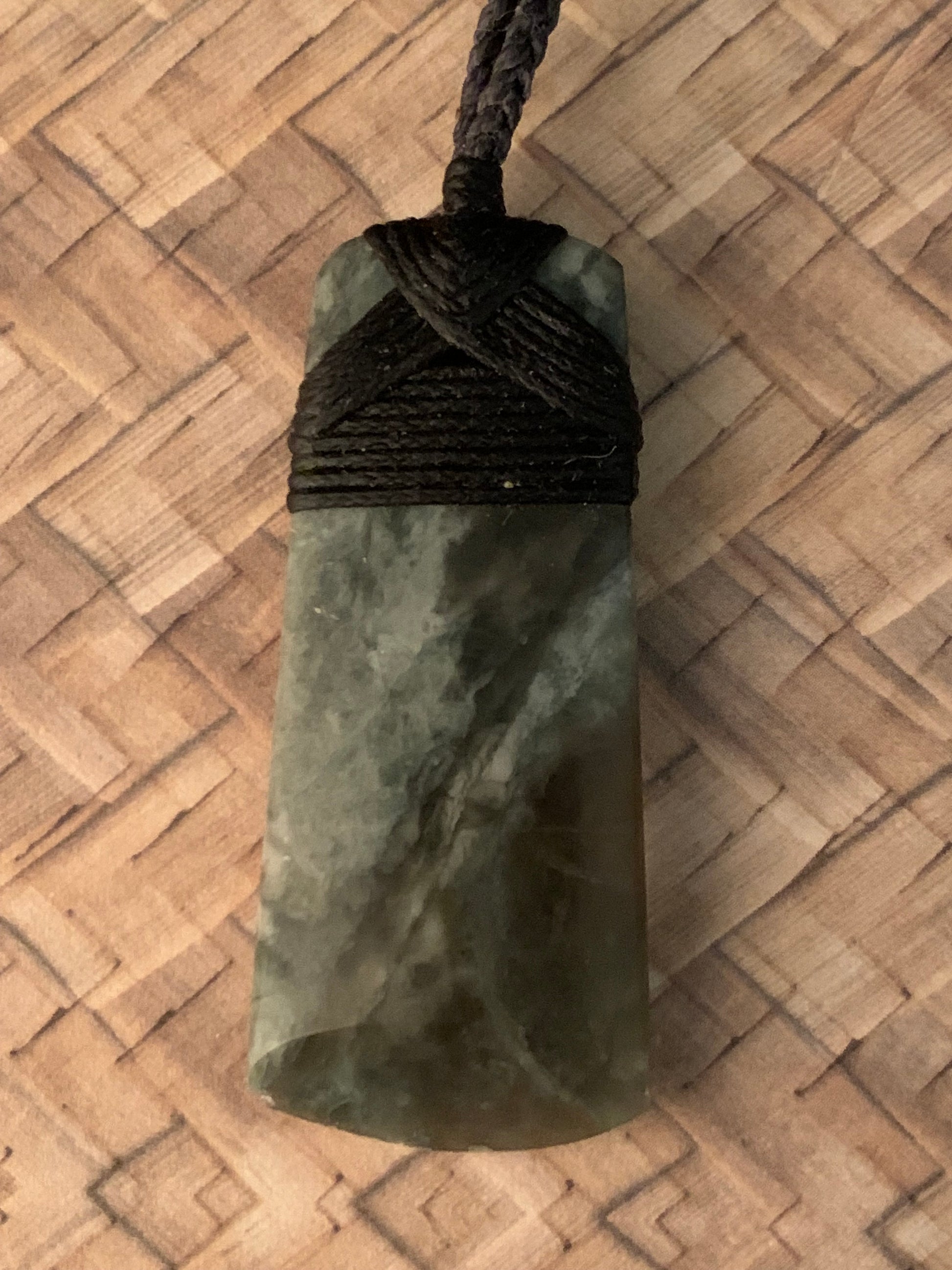 Maori Pounamu hei toki pendant from New Zealand available at Silver Fern Gallery