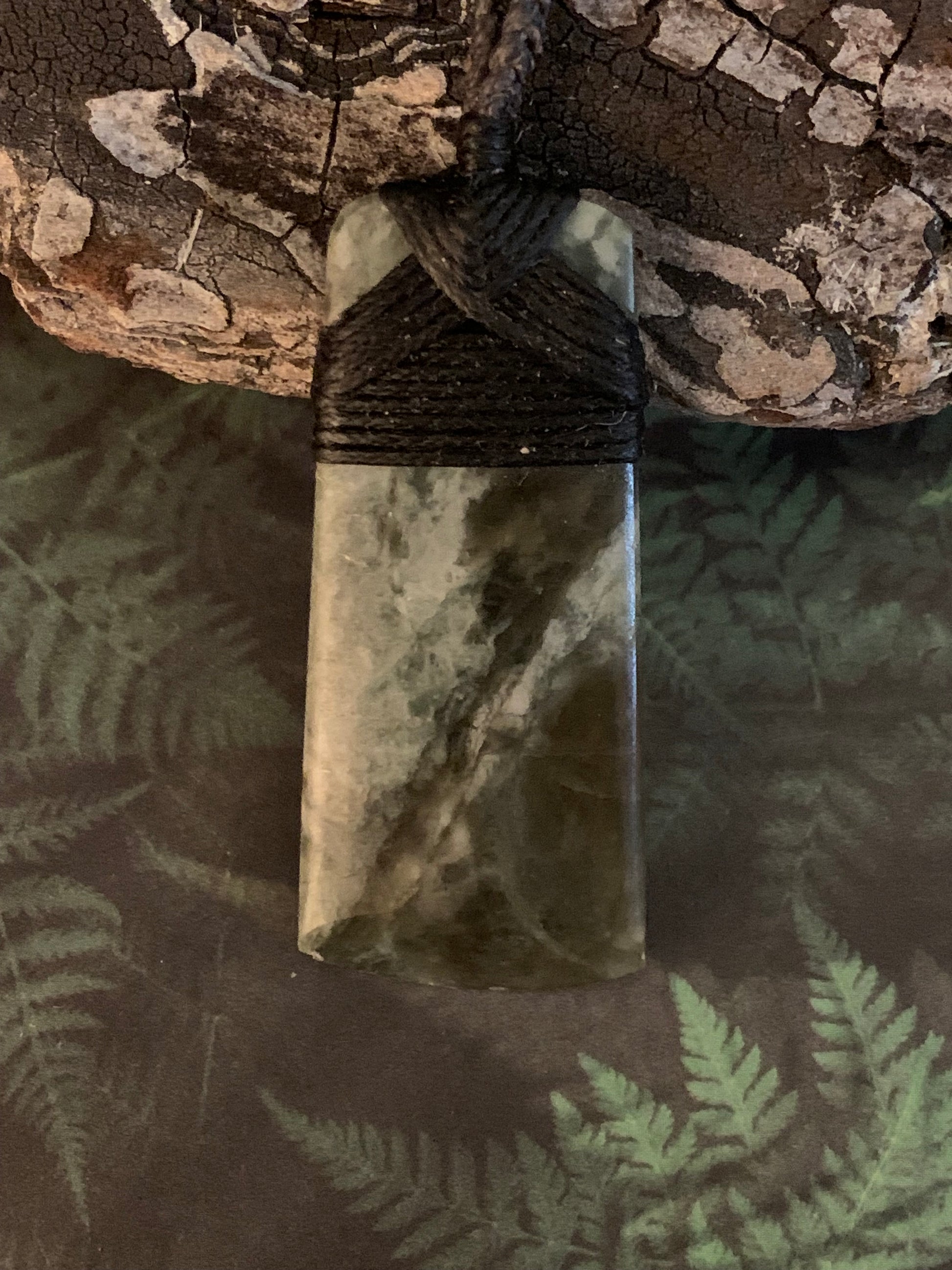 Maori Pounamu hei toki pendant from New Zealand available at Silver Fern Gallery