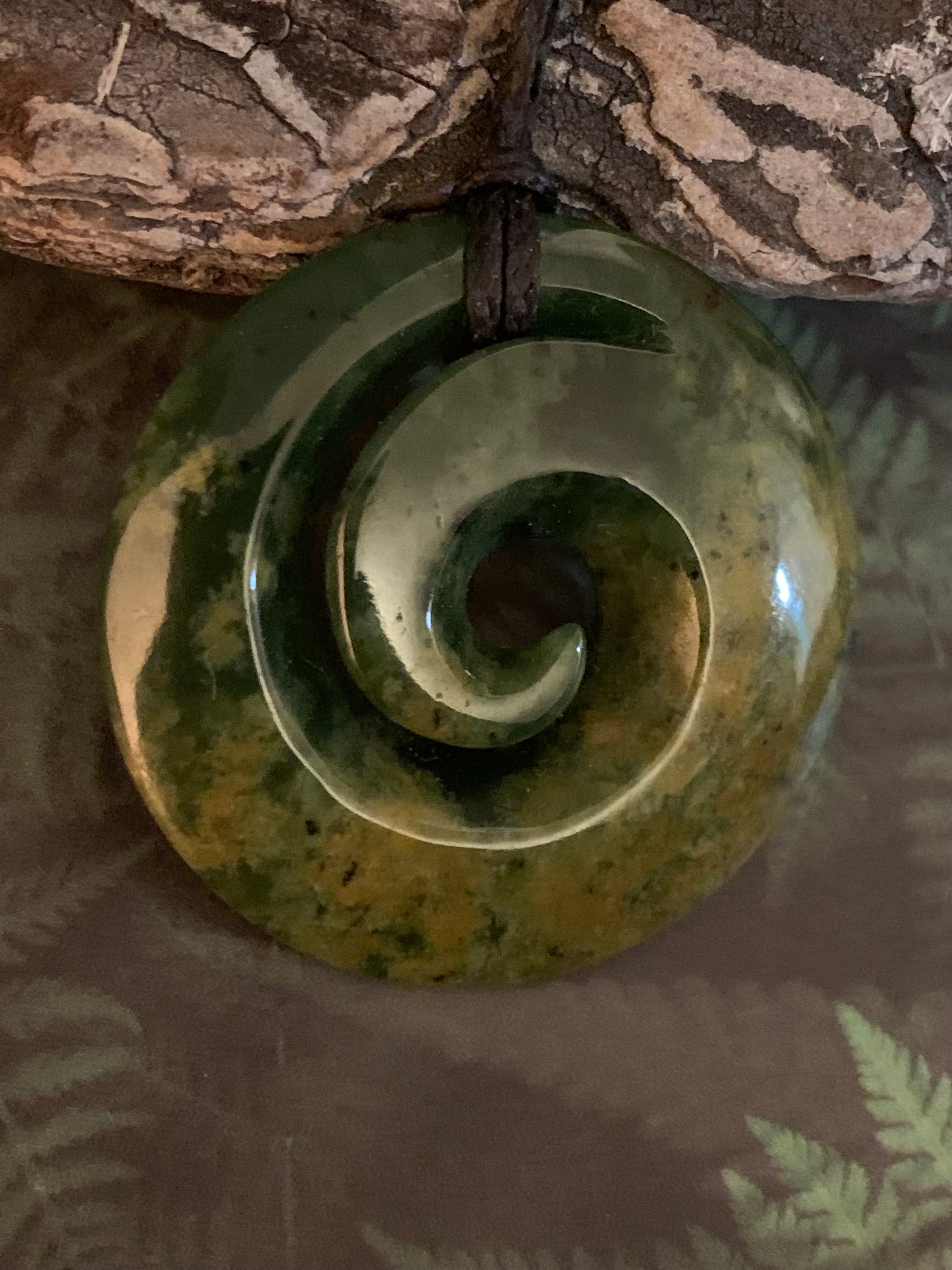 Maori made Koru from New Zealand Pounamu greenstone jade