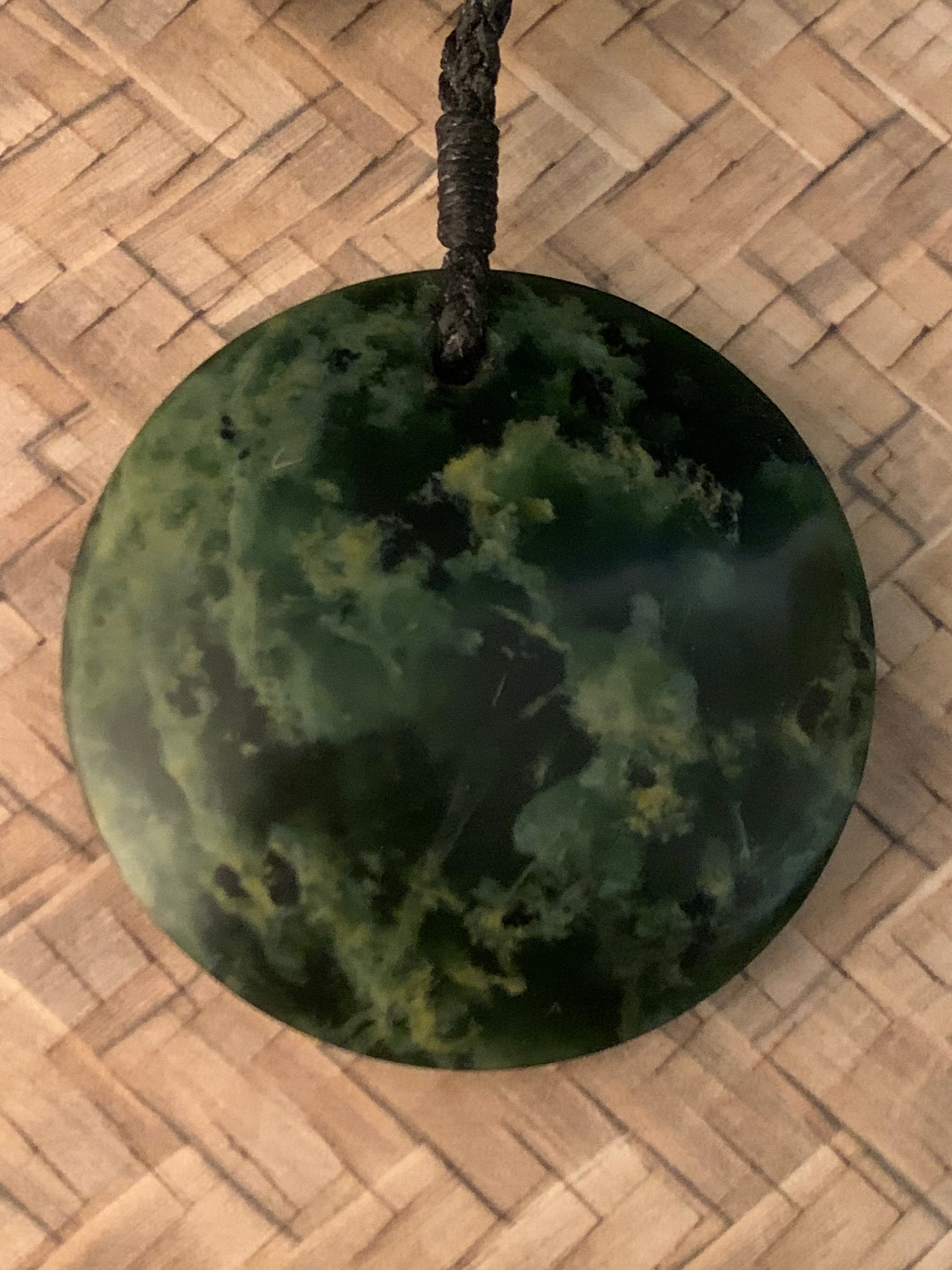pounamu porohita disc made in New Zealand available for purchase from Silver Fern Gallery