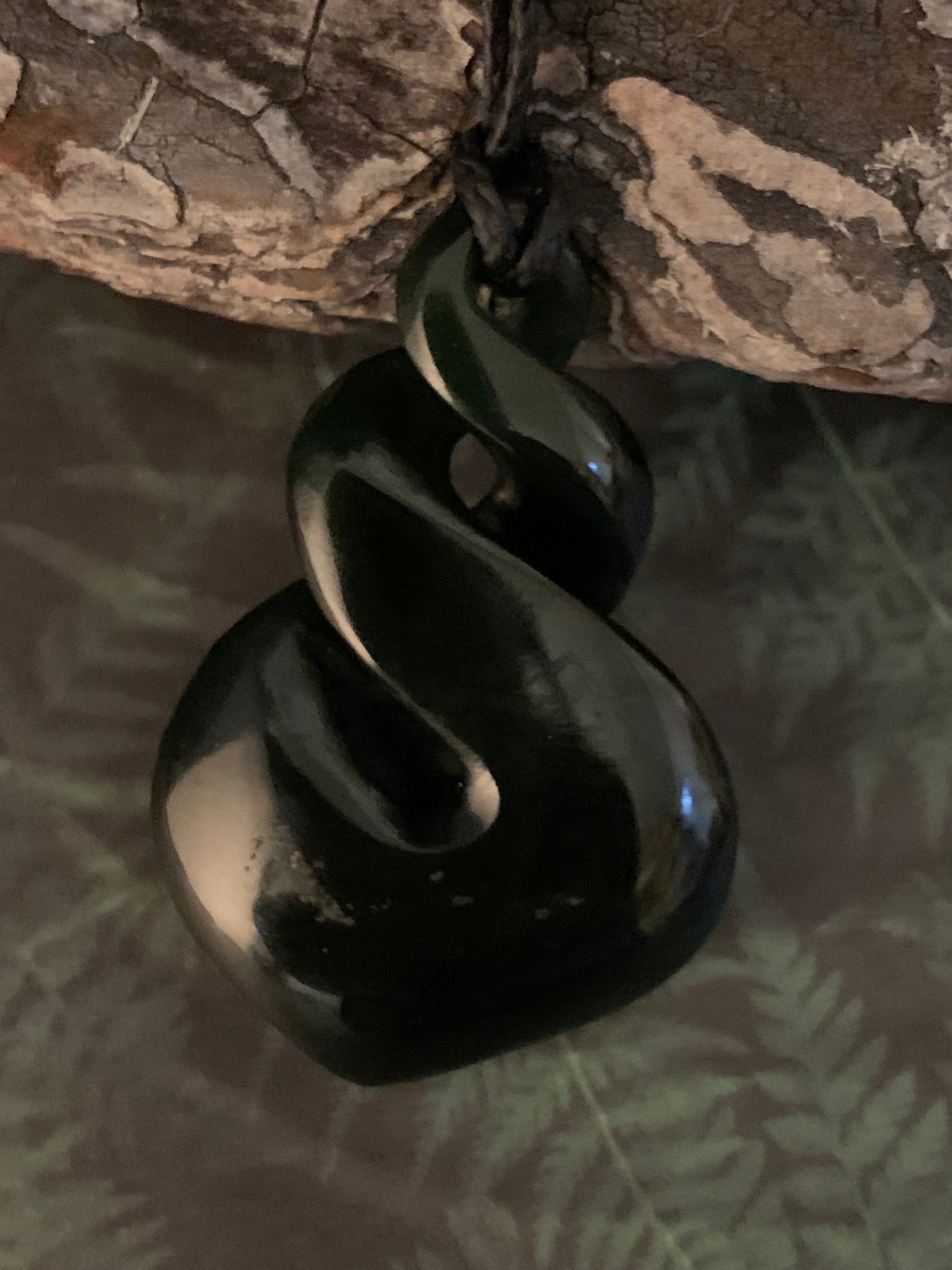 traditional new zealand maori carved pounamu greenstone triple twist pendant on adjustable cord