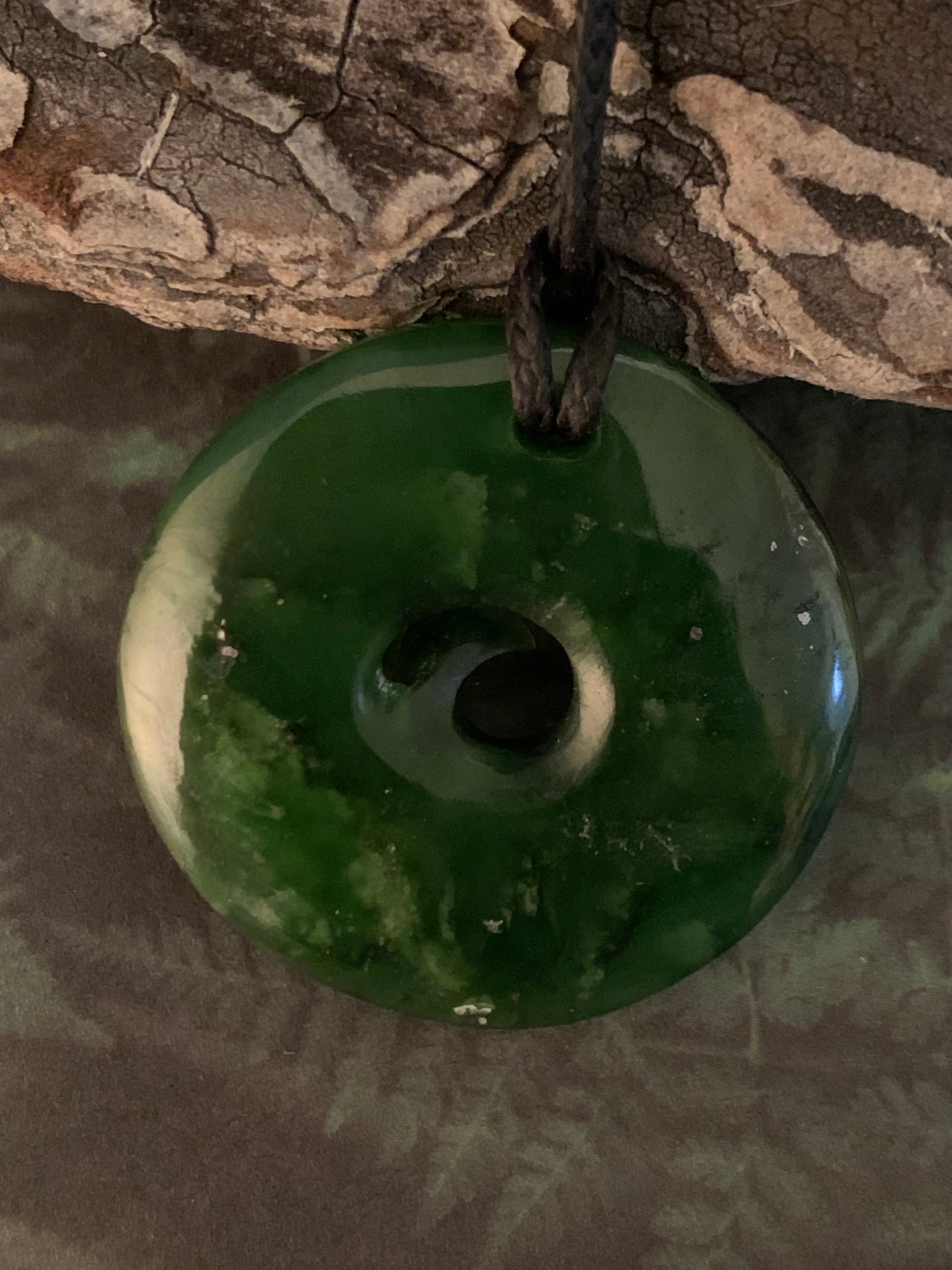 reverse of Pounamu koru pendant from New Zealand available from Silver Fern Gallery