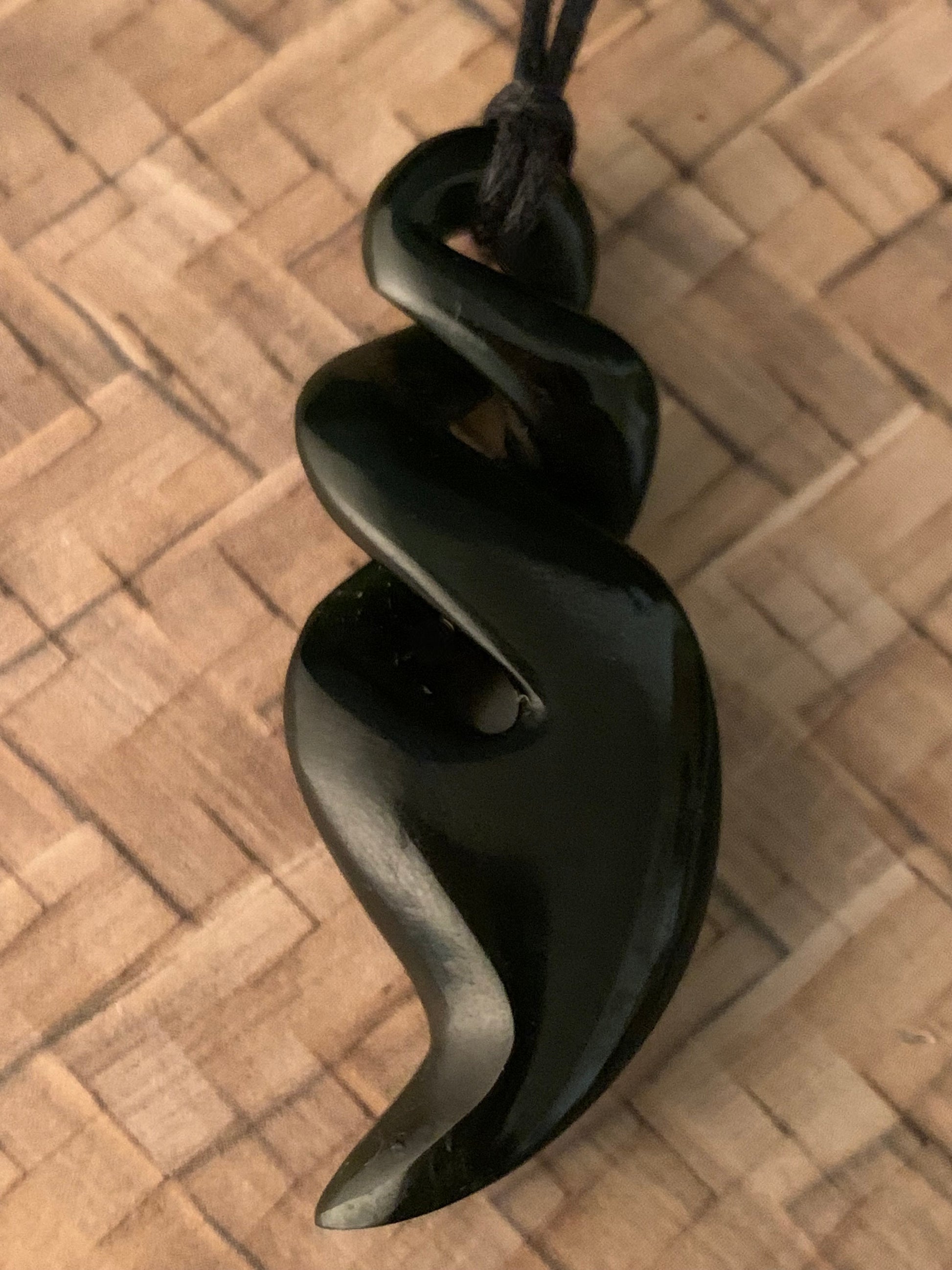 traditional new zealand maori carved pounamu greenstone double twist pendant on adjustable cord