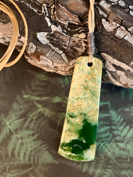 New Zealand Maori toki pounamu adornment available from Silver Fern Gallery