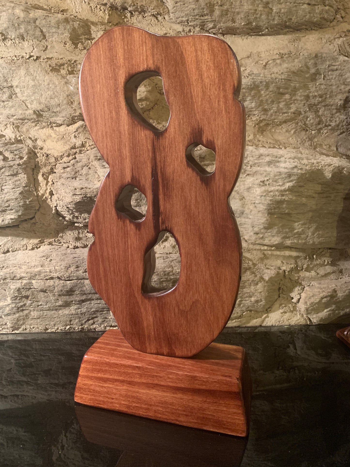 back view of Maori wood manaia on stand carved in New Zealand and available from Silver Fern Gallery