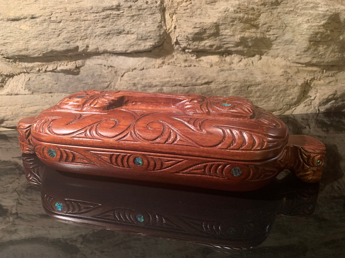 side view of Maori wakahuia jewellery treasure box carved in New Zealand and available from Silver Fern Gallery