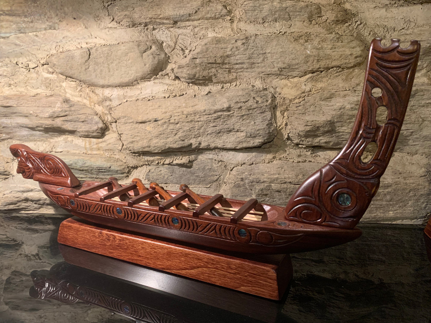 Maori small waka canoe carved in New Zealand and available from Silver Fern Gallery