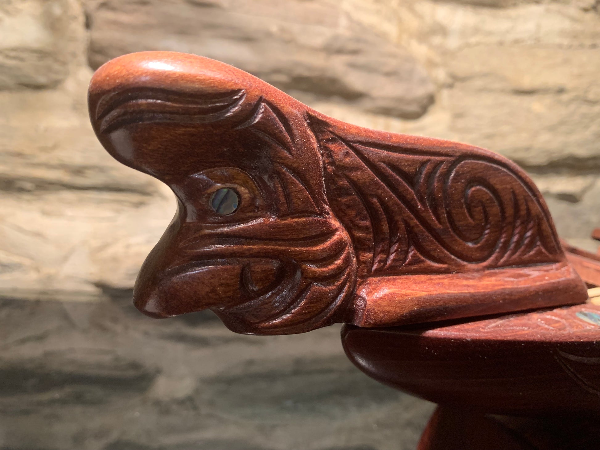 bow view of Maori small waka canoe carved in New Zealand and available from Silver Fern Gallery