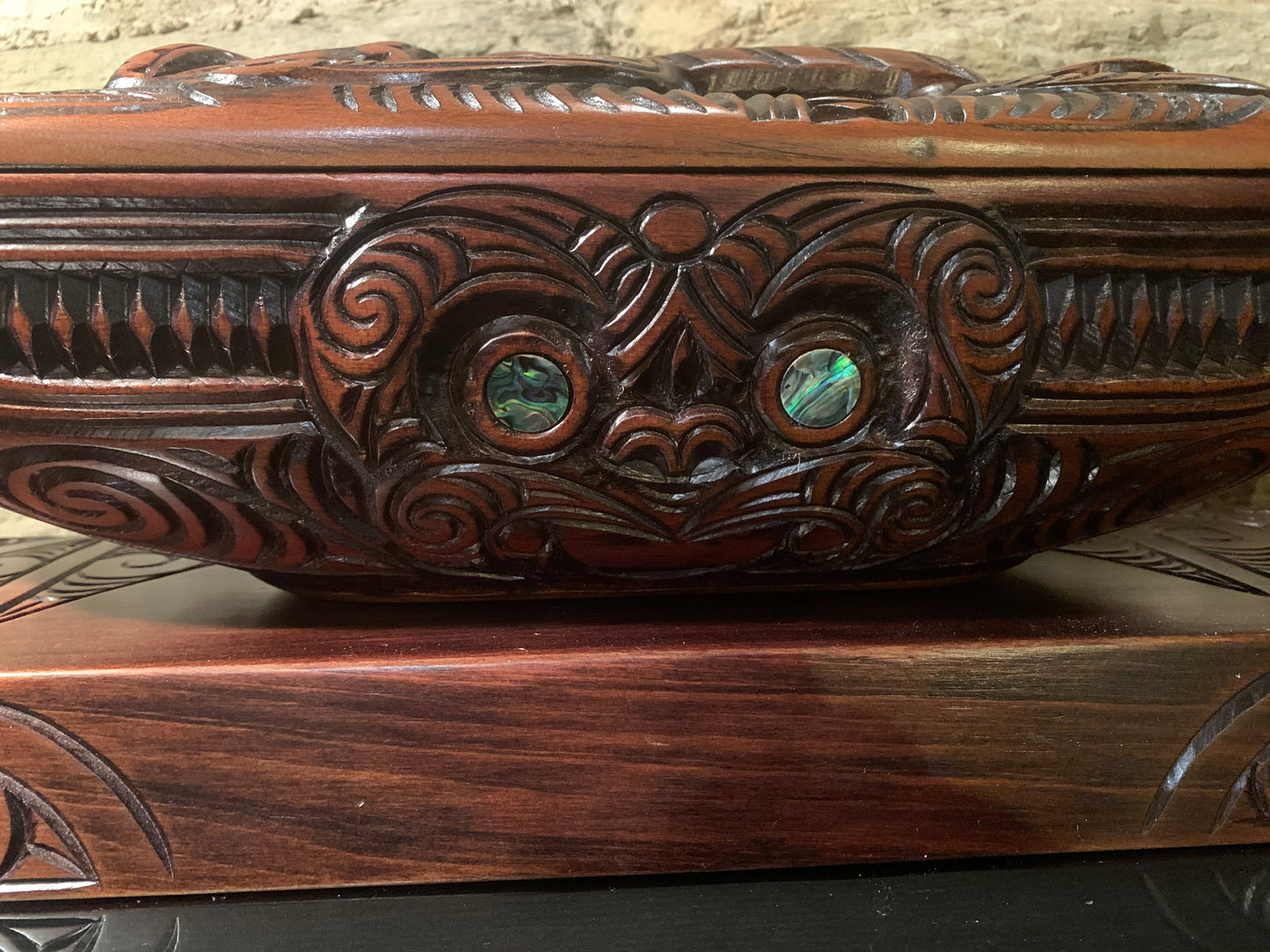 detail of Maori large papa hou carved in New Zealand and available from Silver Fern Gallery