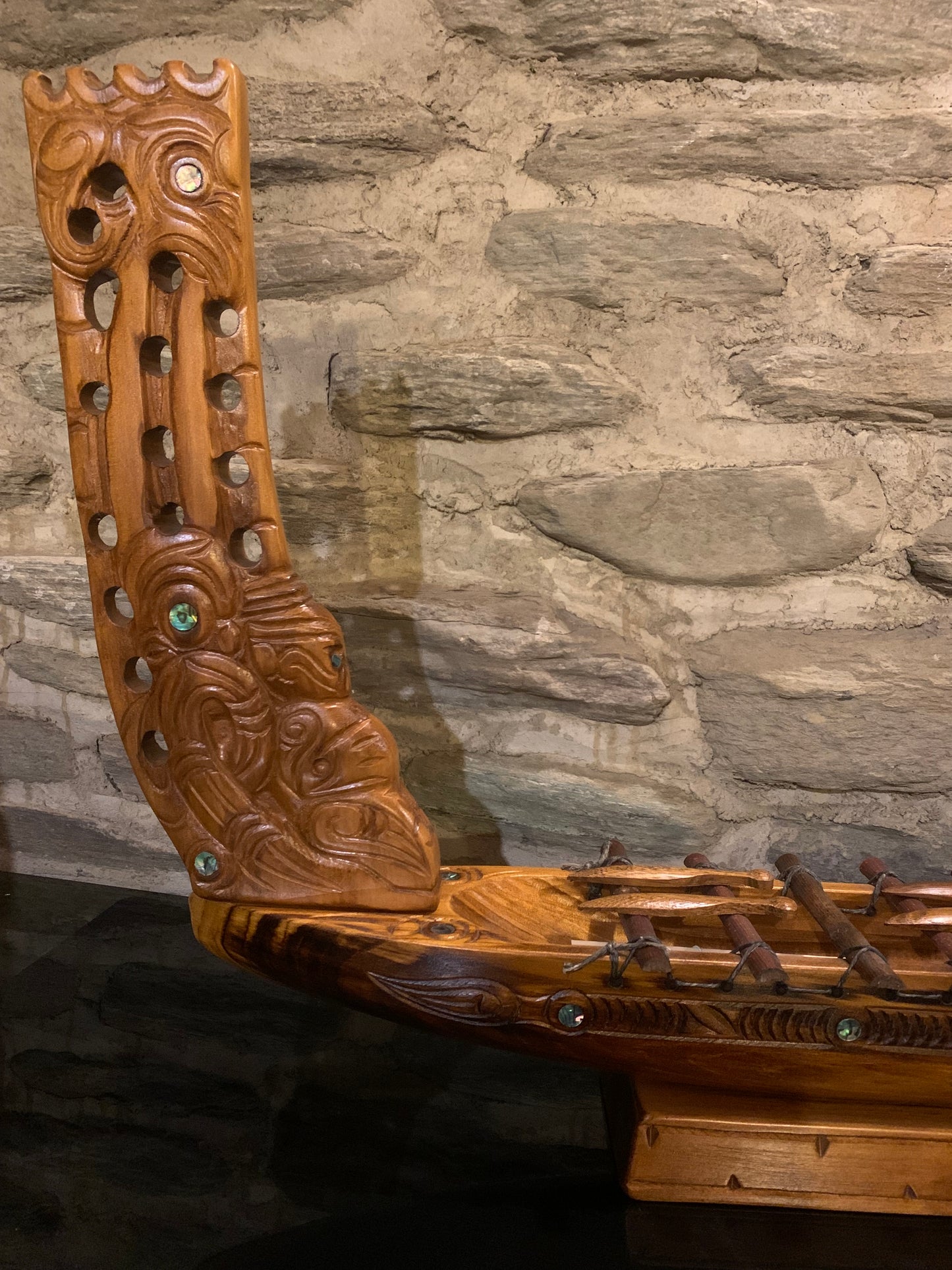 stern view of Maori waka taua war canoe carved in New Zealand and available from Silver Fern Gallery