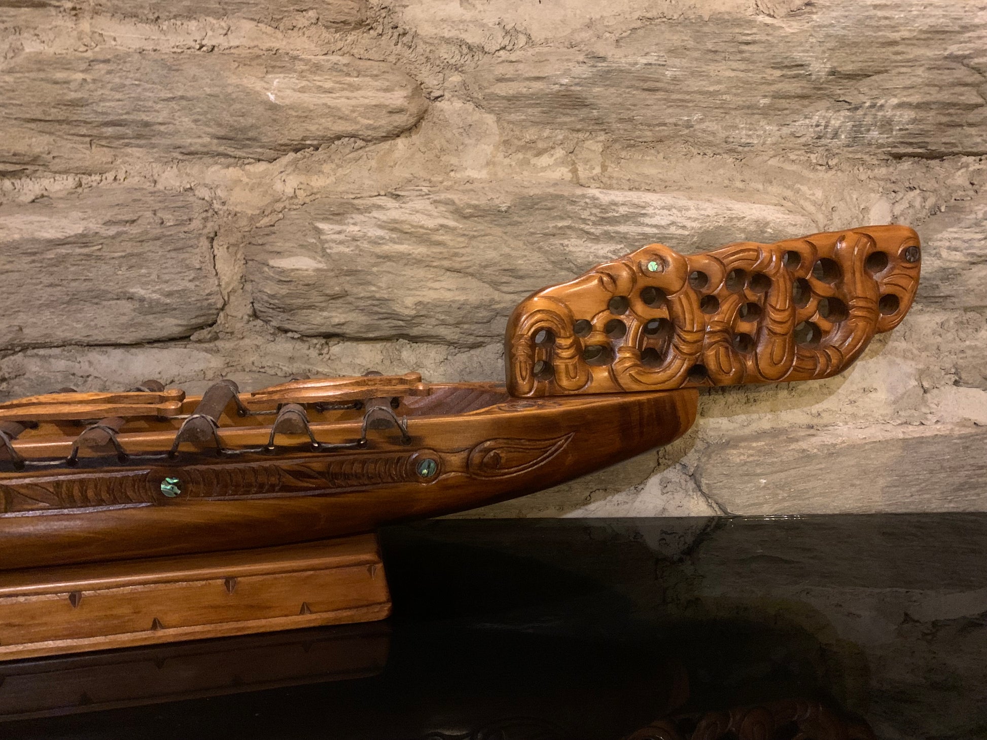 bow detail of Maori waka taua war canoe carved in New Zealand and available from Silver Fern Gallery