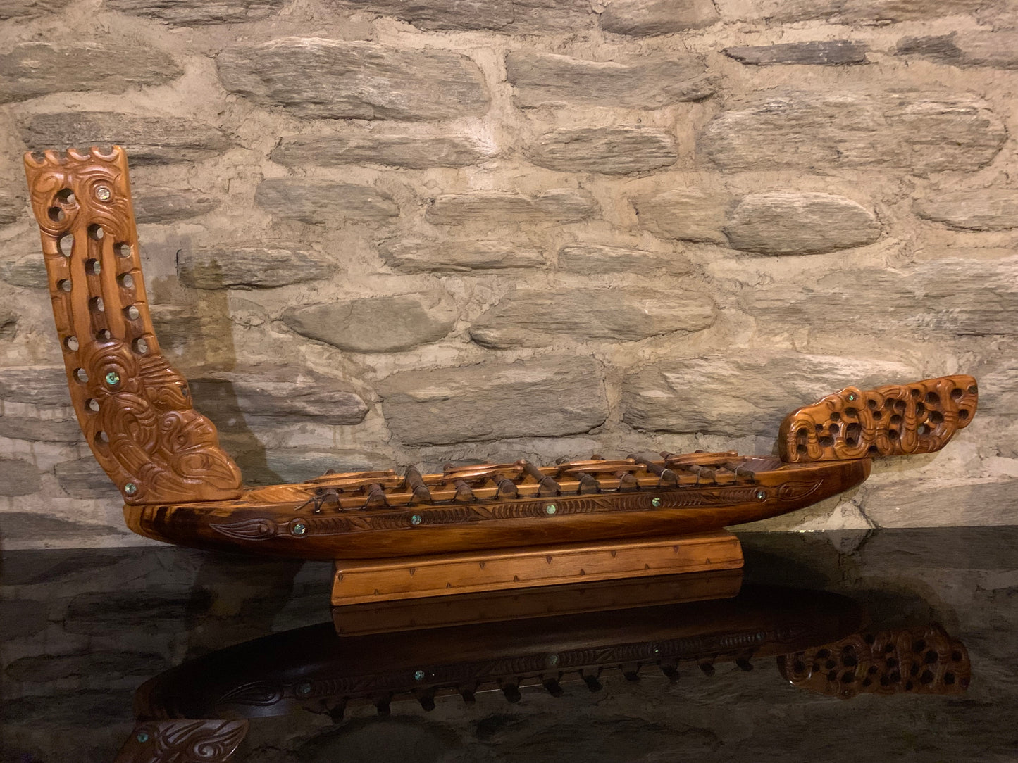 Maori waka taua war canoe carved in New Zealand and available from Silver Fern Gallery