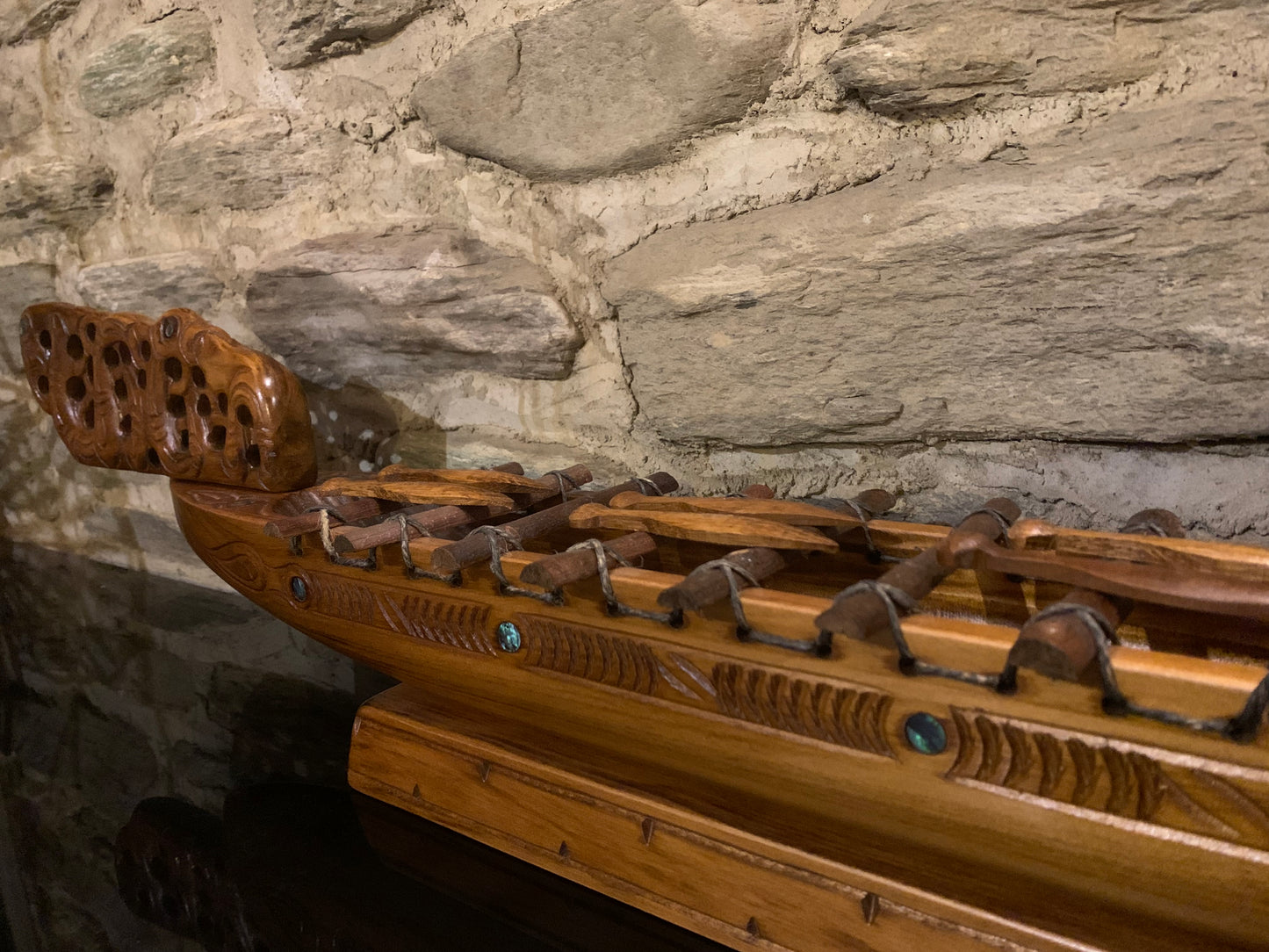 bow end of Maori waka taua war canoe carved in New Zealand and available from Silver Fern Gallery
