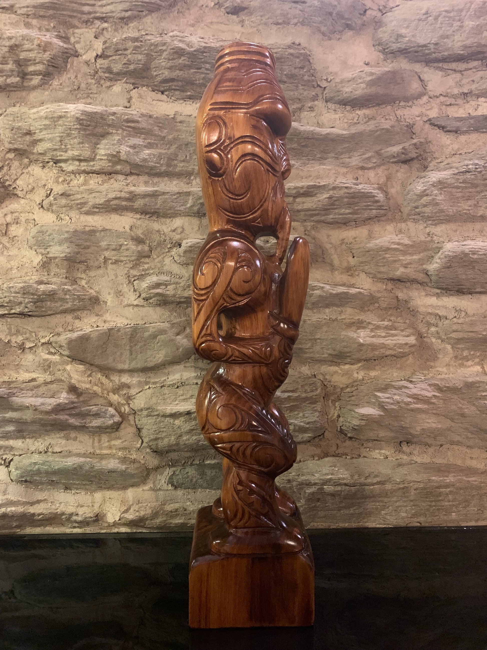 photo facing to the right of New Zealand Maori Teko Teko Wood Carving by Wood Masters Silver Fern Gallery
