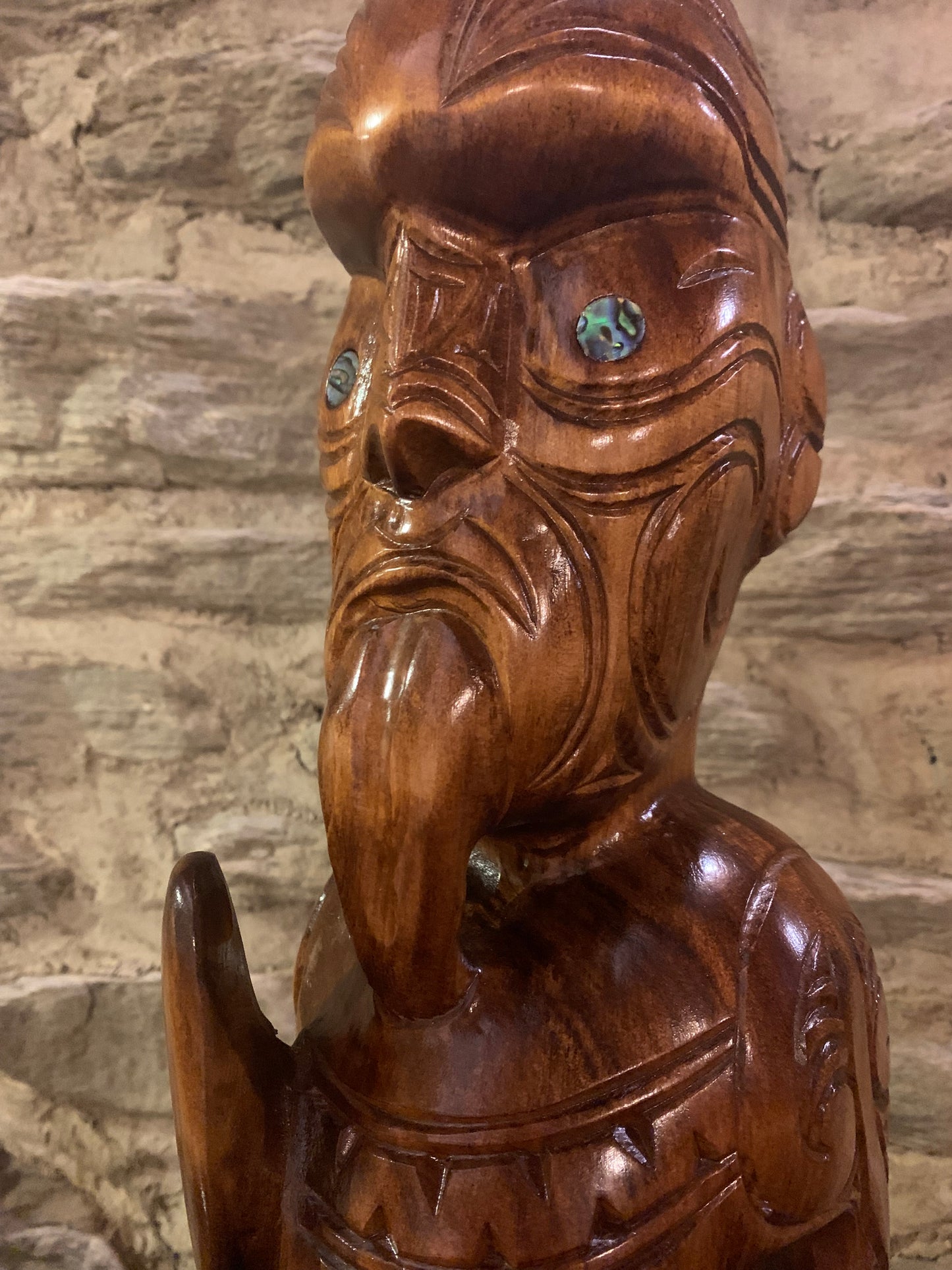 close up of face of  New Zealand Maori Teko Teko Wood Carving by Wood Masters Silver Fern Gallery