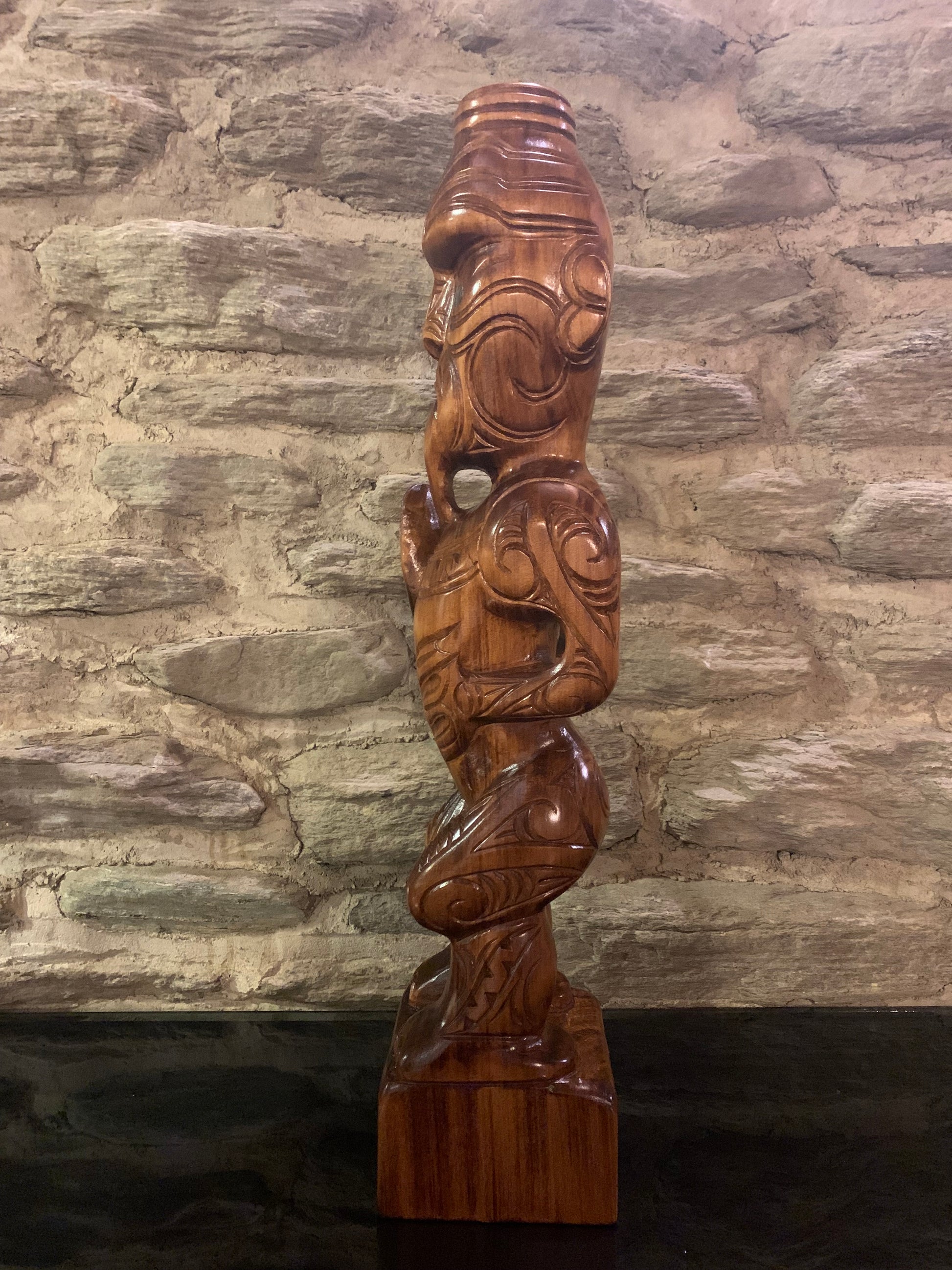 side view to the left of New Zealand Maori Teko Teko Wood Carving by Wood Masters Silver Fern Gallery