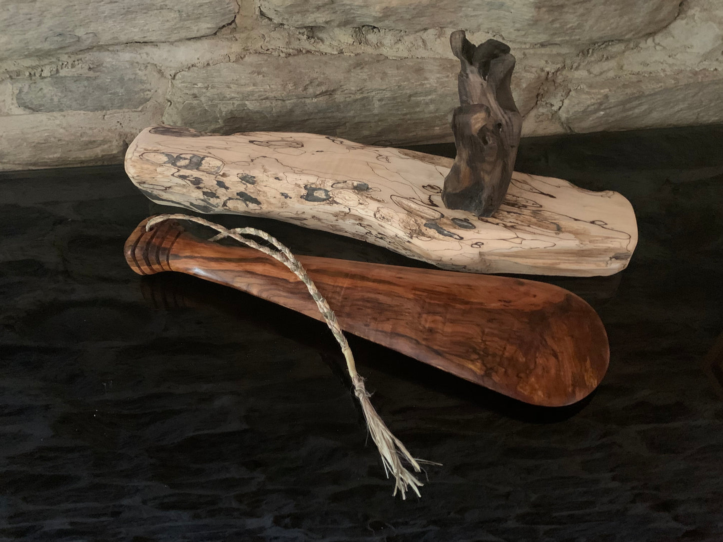 Hand Carved Patu on Driftwood Stand - by Shayne O'Neill