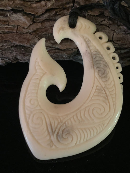 Whale Bone Hei Matau - by Norman Clark