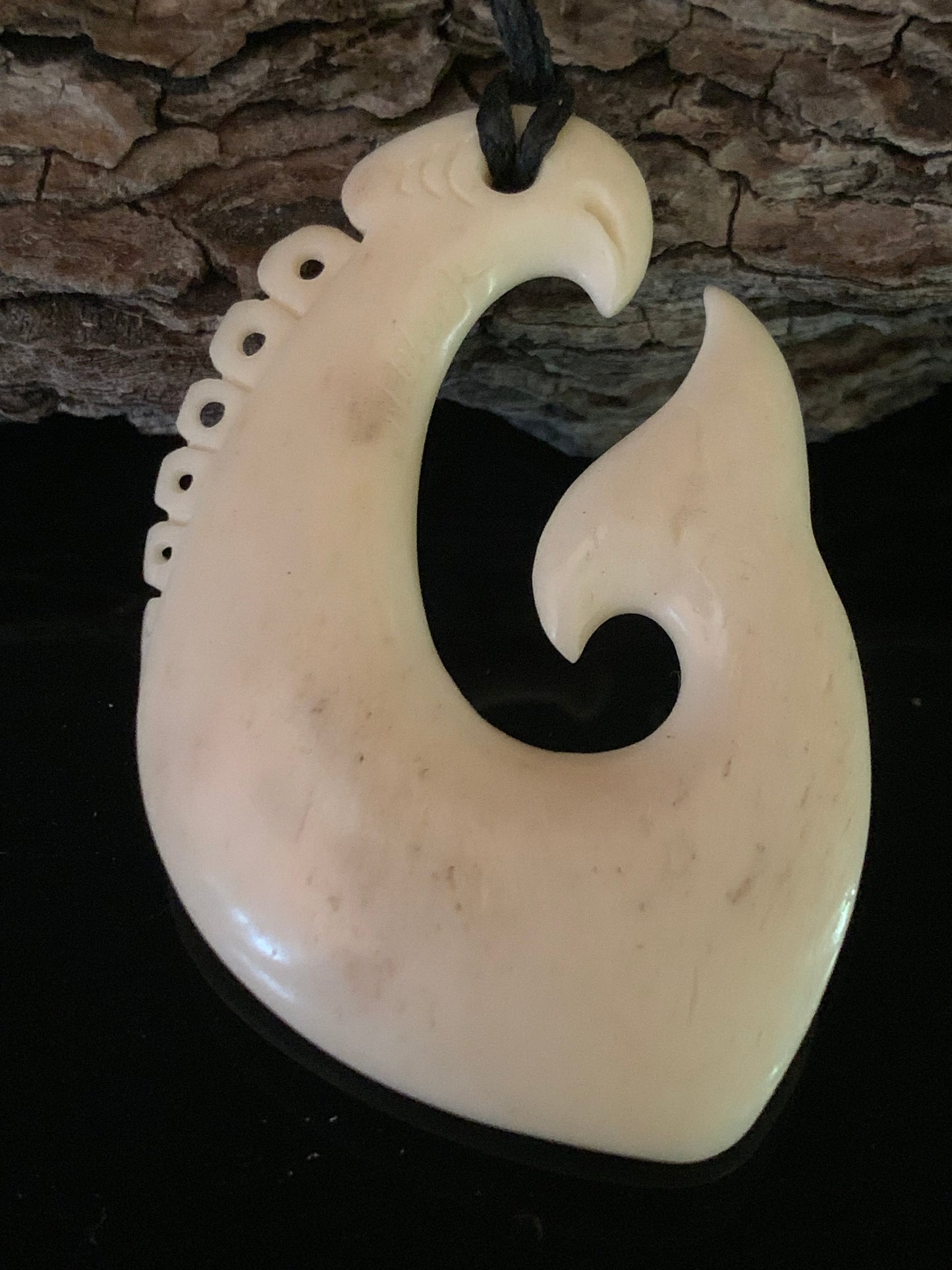 Whale Bone Hei Matau - by Norman Clark